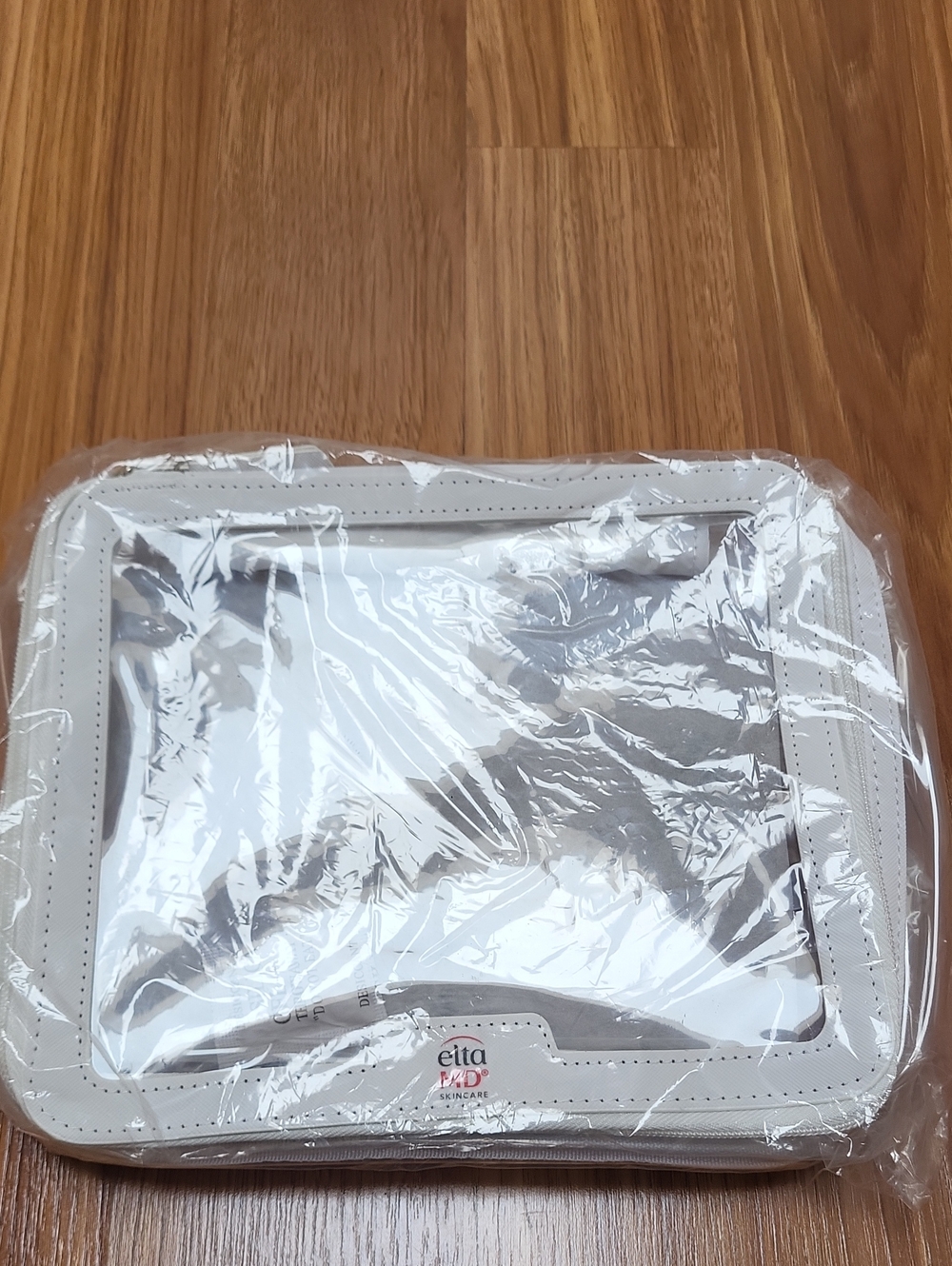 EltaMD Clear Pouch with White Trim and Red Logo
